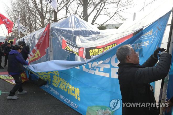 货车司机停止罢工，韩国政府将追求发起者责任